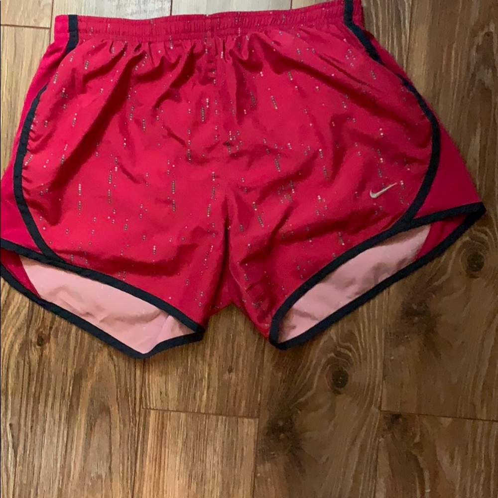 pink dotted nike shorts. youth xl fits like AS